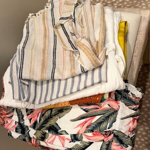 4 tops, 5 shorts and black pants